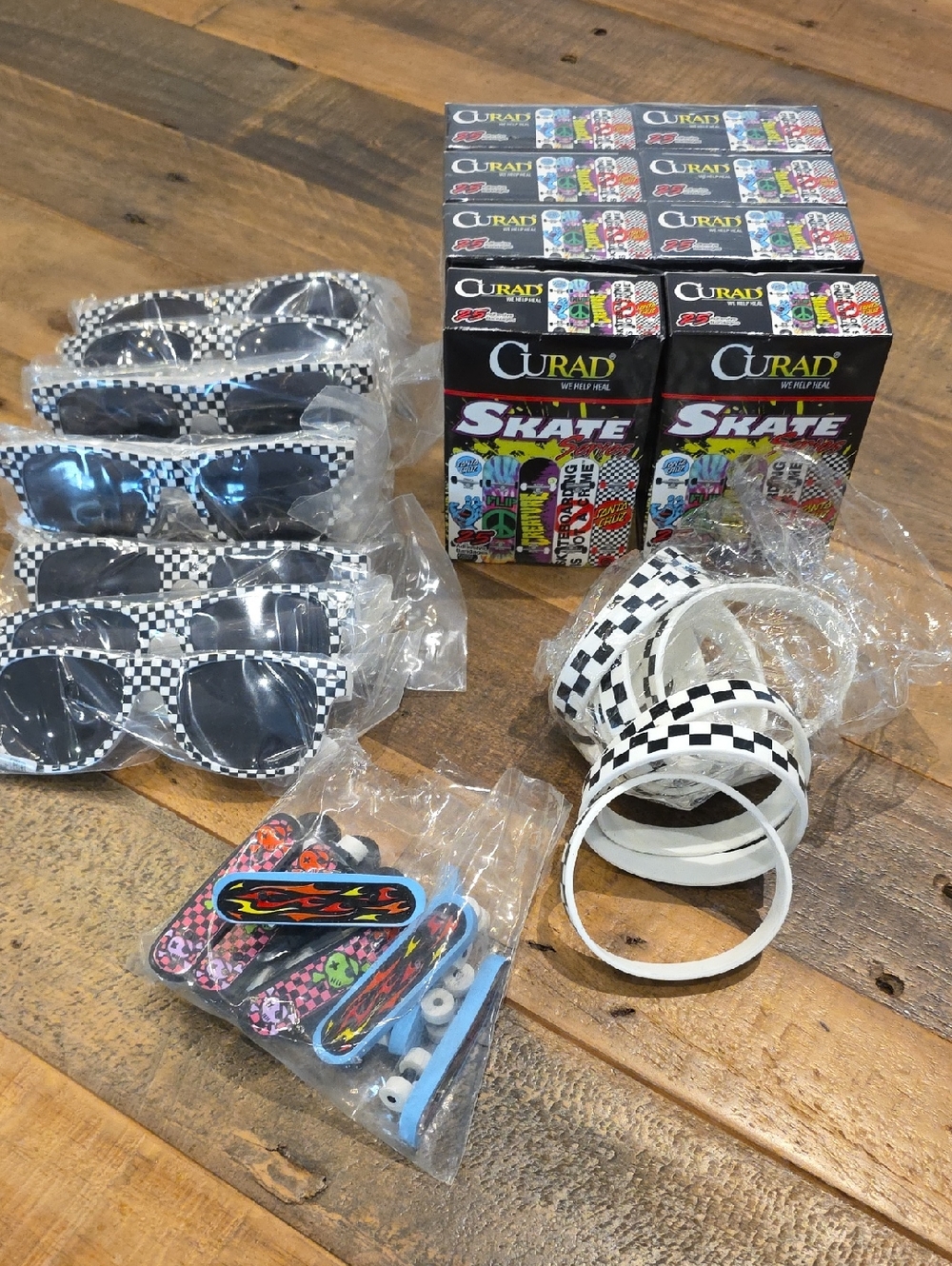 Checkered Skateboard Party Sunglasses & Wristband Party Favor Bundle